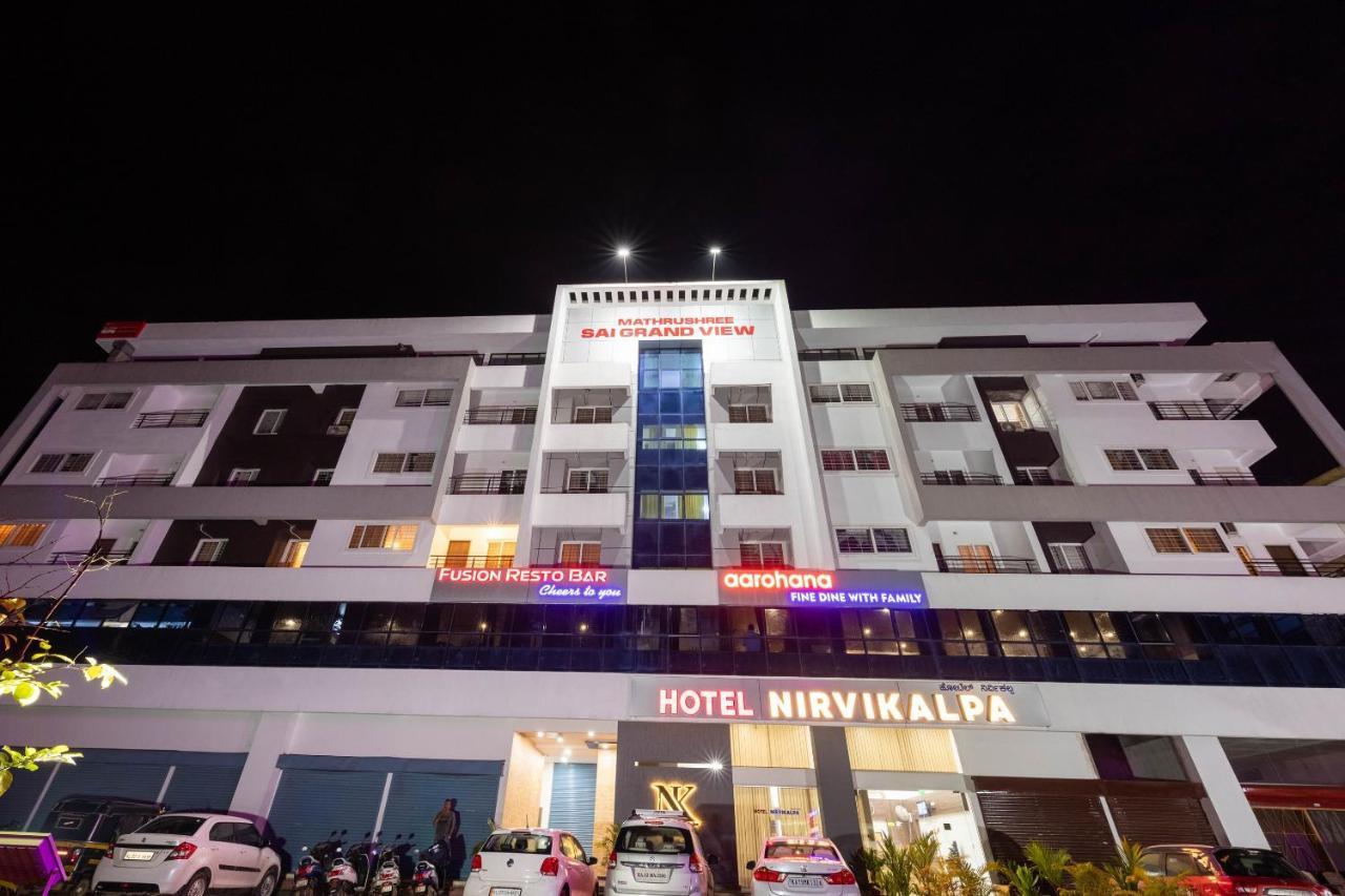 Capital O 26230 Hotel Nirvikalpa Ullāl Exterior photo